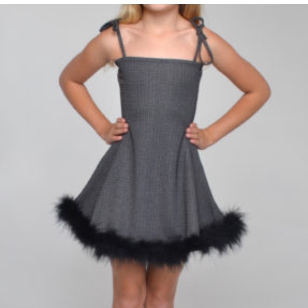 Posh stretch dress with trim and tie up straps.